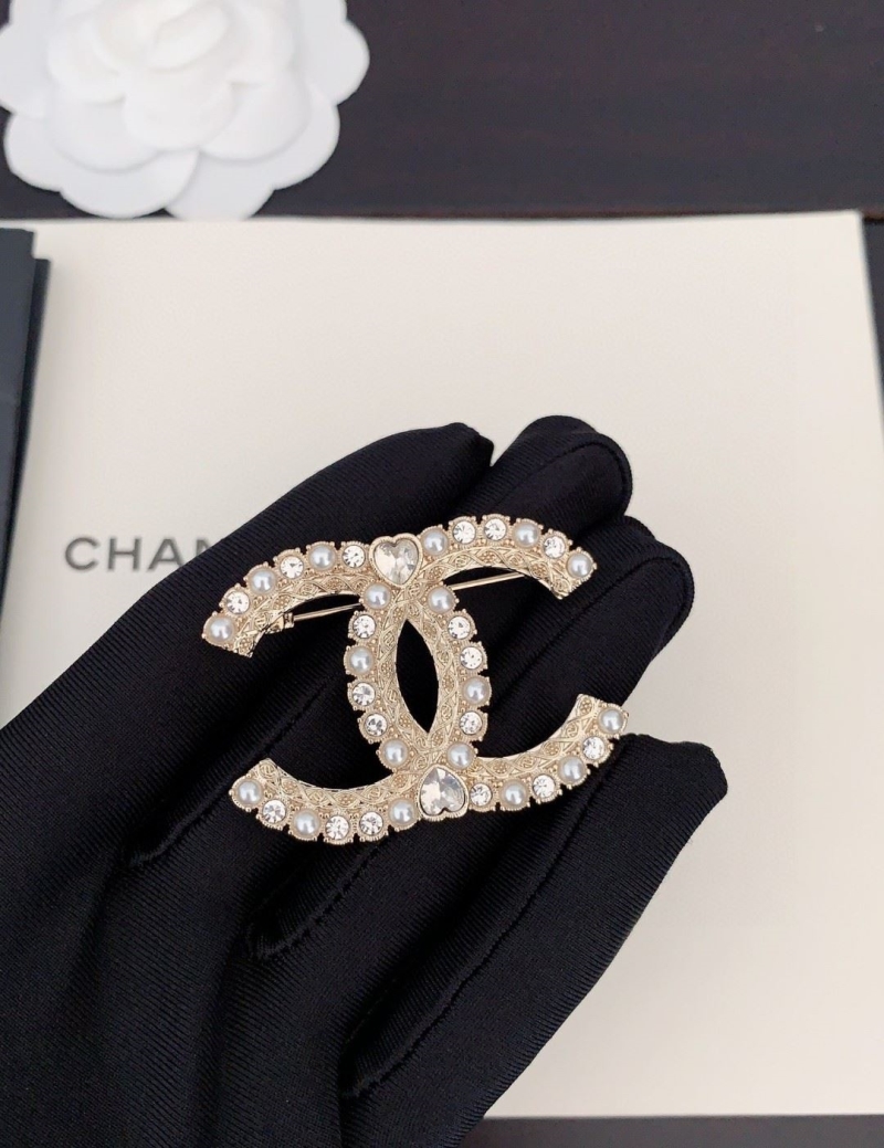 Ch**el brooches